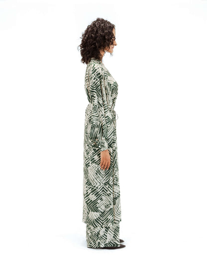 Woman wearing a patterned dress on a white background from Leh Studios.